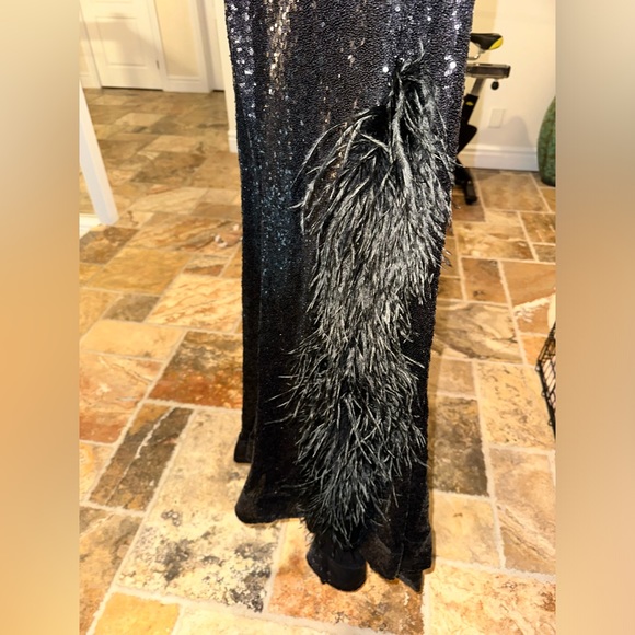 Black sequence and feather detailed Sherri Hill gown. - Picture 3 of 4